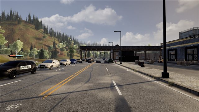 Abandoned cars and a police car on an avenue
